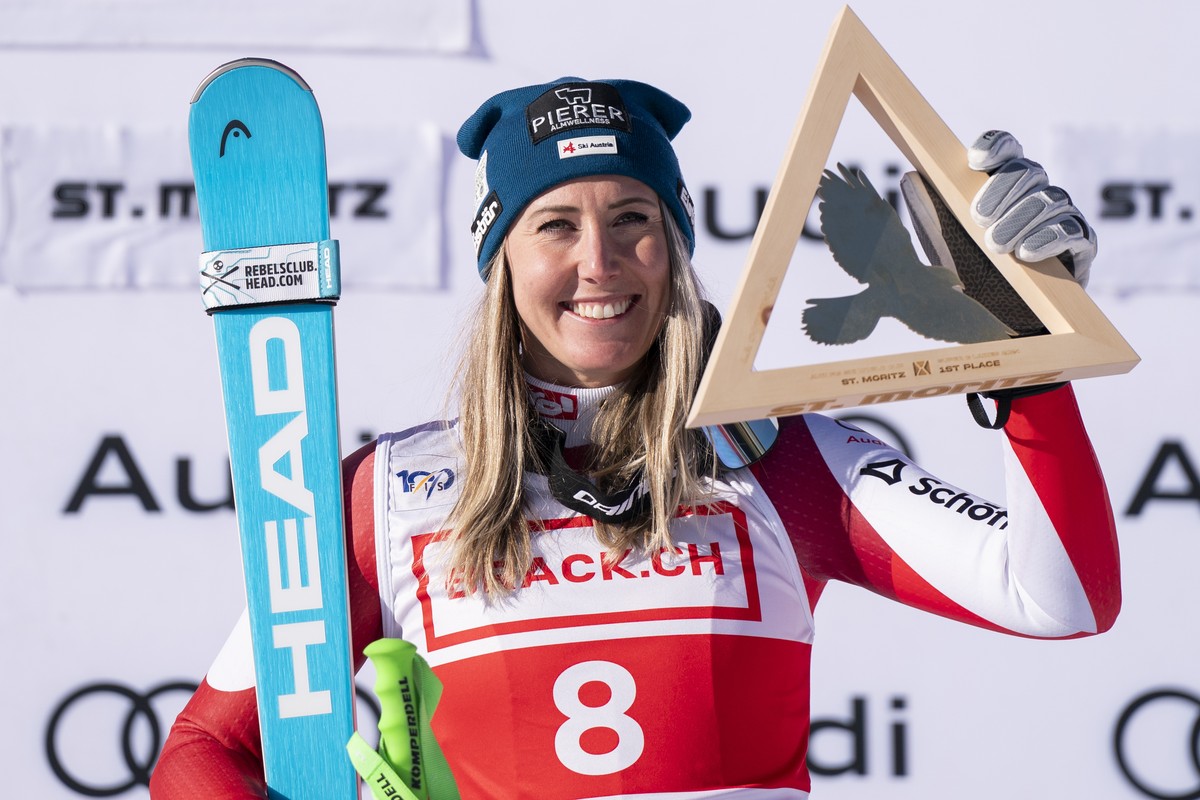 epa11788155 First-placed Cornelia Huetter of Austria poses on the podium after the Women's Super-G race at FIS Alpine Skiing World Cup event in St. Moritz, Switzerland, 21 December 2024. EPA/TIL ...